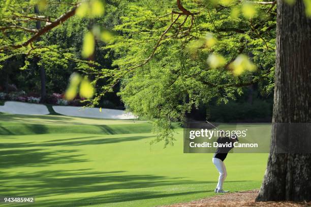 Jordan Spieth of the United States plays his second shot on the 13th hole during the final round of the 2018 Masters Tournament at Augusta National...