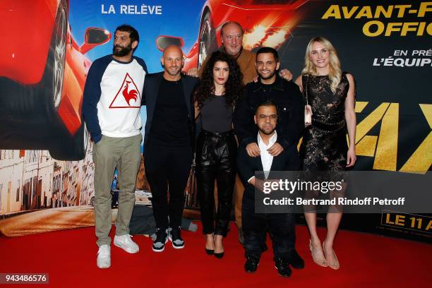 Ramzy Bedia, Franck Gastambide, Sabrina Ouazani, Bernard Farcy,Malik Bentalha, Anouar Toubali and Sand Van Roy attend "Taxi 5" Paris Premierere at Le...