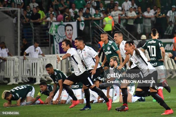 Players of Corinthians celebrate after their team won the 2018 Paulista championship final football match against Palmeiras held at Allianz Parque...