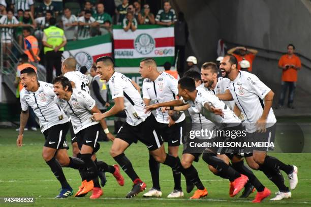 Players of Corinthians celebrate after their team won the 2018 Paulista championship final football match against Palmeiras held at Allianz Parque...