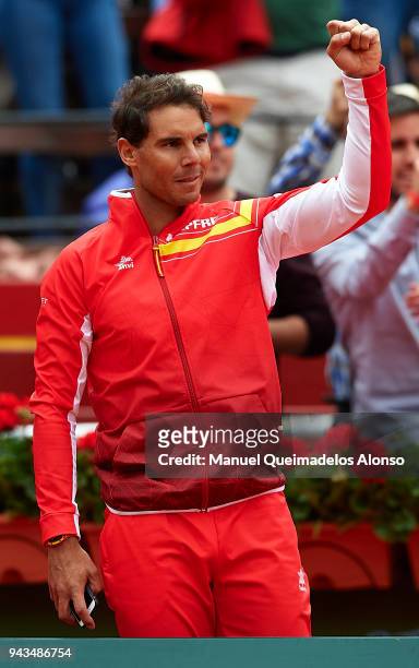 Rafael Nadal of Spain celebrates for David Ferrer of Spain during his match against Philipp Kohlschreiber of Germany during day three of the Davis...