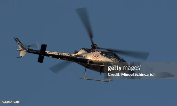 Helicopter with the logo of Corinthians team flying over the match between Palmeiras and Corinthians of the final of Paulista Championship 2018 at...