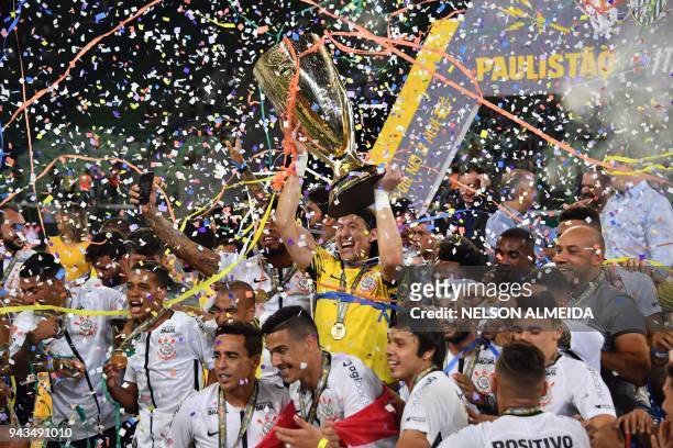 Corinthians captain Cassio holds the Paulista championship Cup after winning the final match against Palmeiras held at Allianz Parque stadium, in Sao...