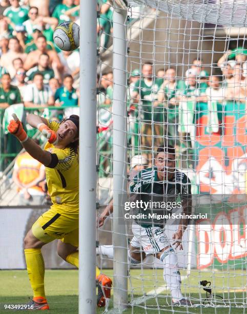 Willian of Palmeiras shoots the ball against goalkeeper Cassio of Corinthians during a match between Palmeiras and Corinthians of the final of...