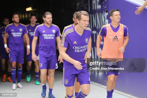 Jonathan Spector of Orlando City SC leads the team out during an MLS soccer match against the Portland Timbers at Orlando City Stadium on April 8,...