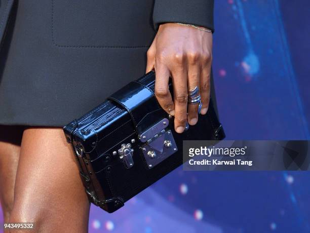 Letitia Wright, bag detail, attends the UK Fan Event for "Avengers Infinity War" at Television Studios White City on April 8, 2018 in London, England.