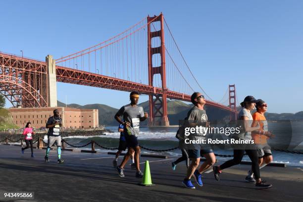 Participants race in the United Airlines Rock 'N' Roll Half Marathon San Francisco on April 8, 2018 in San Francisco, California.