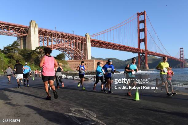 Participants race in the United Airlines Rock 'N' Roll Half Marathon San Francisco on April 8, 2018 in San Francisco, California.