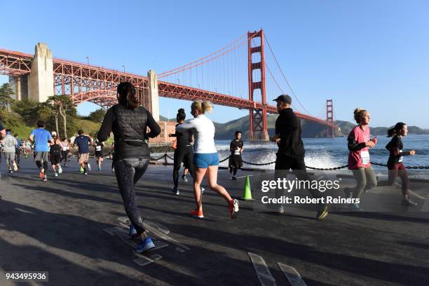 Participants race in the United Airlines Rock 'N' Roll Half Marathon San Francisco on April 8, 2018 in San Francisco, California.