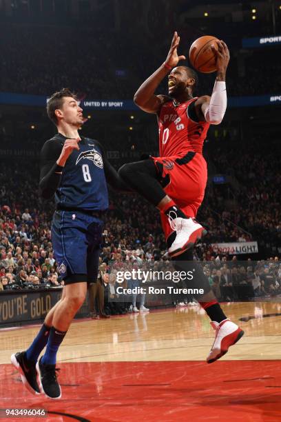 Miles of the Toronto Raptors drives to the basket during the game against Mario Hezonja of the Orlando Magic on April 8, 2018 at the Air Canada...