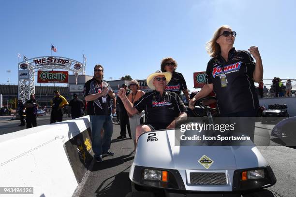 Ken Black and wife Judy cheer on Brittany Force John Force Racing NHRA Top Fuel Dragster as he makes his semifinal run during the DENSO Spark Plugs...