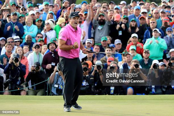 Patrick Reed of the United States celebrates after making par 18th green during the final round to win the 2018 Masters Tournament at Augusta...