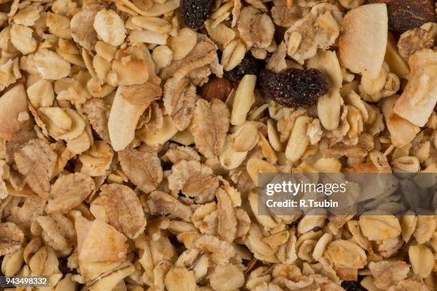 pile of muesli cereal - raisin bran stock pictures, royalty-free photos & images