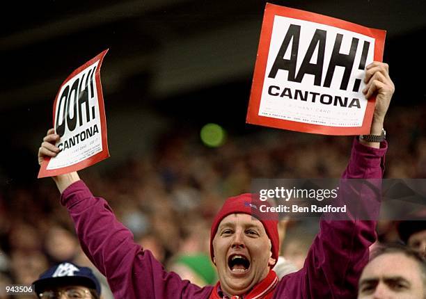 ''Ooh! Aah! Cantona!'' sings a Manchester United fan during the FA Carling Premiership match against Middlesbrough at the Riverside Stadium in...
