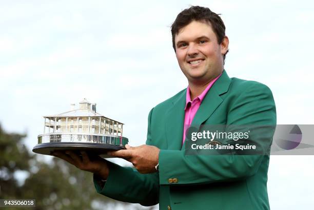 Patrick Reed of the United States celebrates with the trophy during the green jacket ceremony after winning the 2018 Masters Tournament at Augusta...