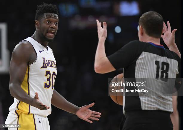 Julius Randle of the Los Angeles Lakers complains to referee Matt Boland after being called for a foul in the first half at Staples Center on April...