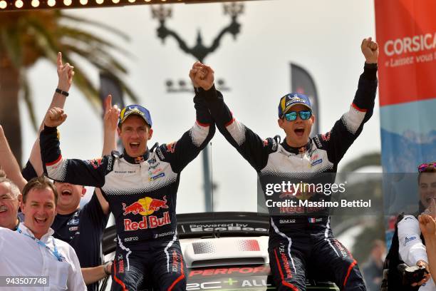 Sebastien Ogier of France and Julien Ingrassia of France celebrate their victory in the final podium in Ajaccio during Day Three of the WRC France on...