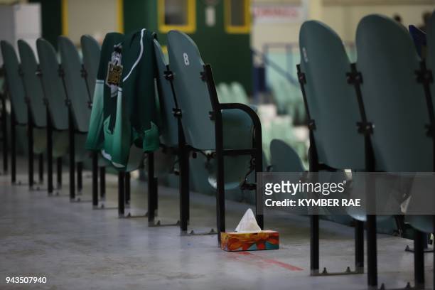 Box of tissues is seen amid seating at the Humboldt Uniplex during preparations for a prayer vigil for the Humboldt Broncos ice hockey team, April 8,...