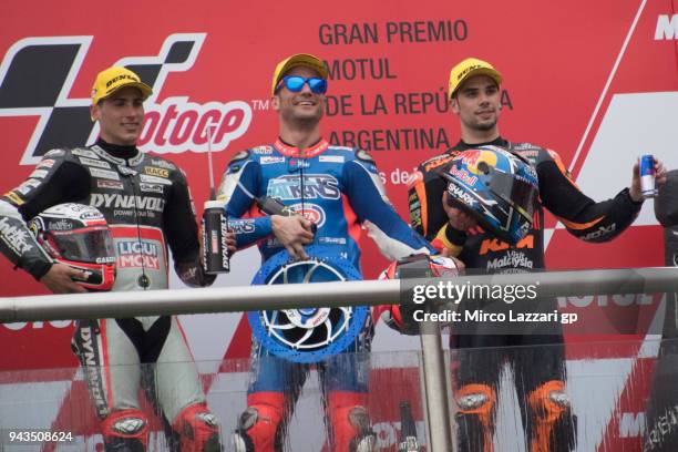 Xavi Vierge of Spain and Dynavolt Intact GP, Mattia Pasini of Italy and Italtrans Racing and Miguel Oliveira of Portugal and Red Bull KTM Ajo...