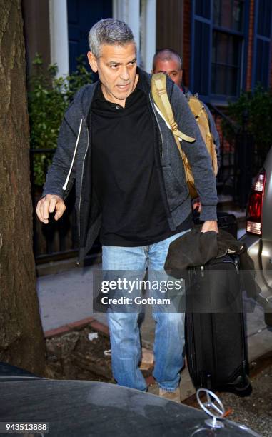 George Clooney is seen leaving his townhouse on April 8, 2018 in New York City.