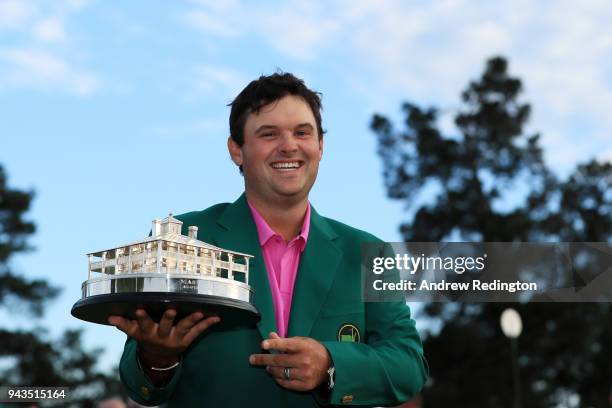 Patrick Reed of the United States celebrates with the trophy during the green jacket ceremony after winning the 2018 Masters Tournament at Augusta...