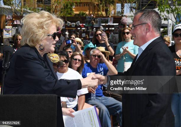 Las Vegas Mayor Carolyn Goodman introduces Academy of Country Music CEO Pete Fisher at the Nathan Adelson Hospice Route 91 Remembrance ceremony at...