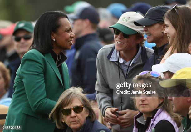 Condoleezza Rice, former Secretary of State, watches play on the 18th green during the final round of the 2018 Masters Tournament at Augusta National...