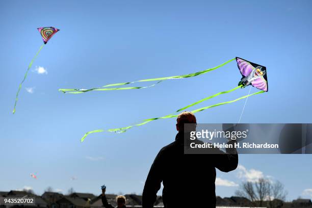 Ed McBride flies his kite during the annual Arvada Kite Festival at Stegner Sports Complex on April 8, 2018 in Arvada, Colorado. The wind, while...