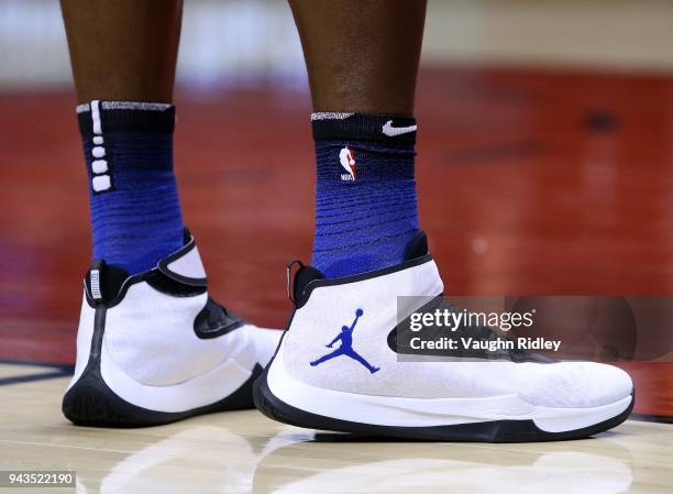 The shoes worn by Bismack Biyombo of the Orlando Magic during the second half of an NBA game against the Toronto Raptors at Air Canada Centre on...