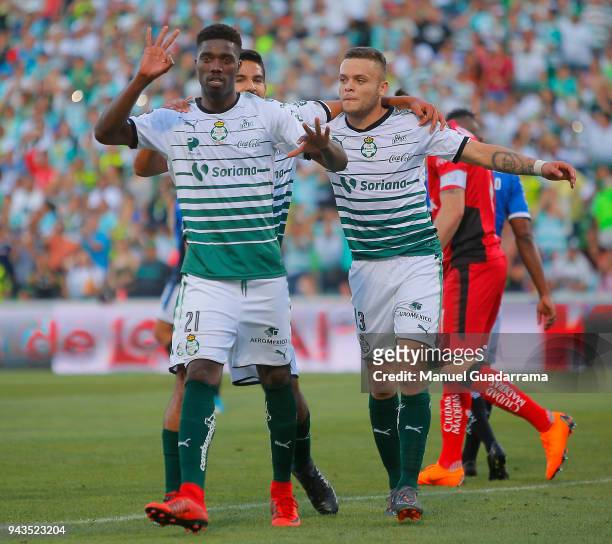 Jorge Djaniny Tavares of Santos celebrates with teammates after scoring the second goal of his team during the 14th round match between Santos Laguna...
