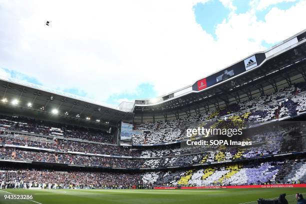Real Madrid supporters seen before the game between Real Madrid and Atletico de Madrid FC at Estadio Santiago Bernabeu. .