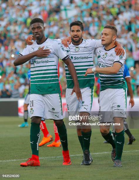 Jorge Djaniny Tavares of Santos celebrates with teammates after scoring the second goal of his team during the 14th round match between Santos Laguna...