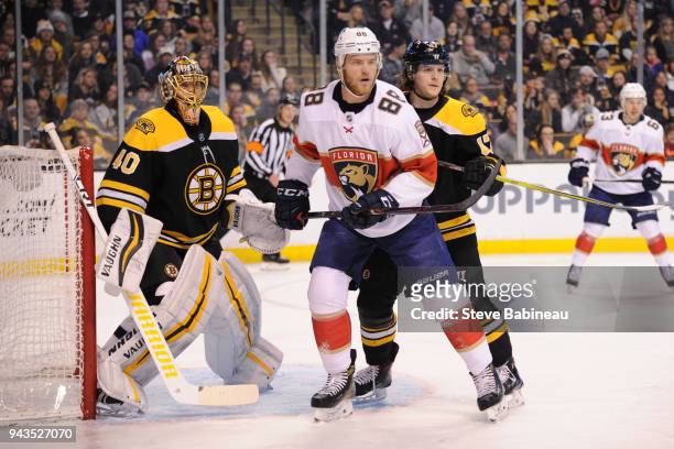 Jamie McGinn of the Florida Panthers against Tuukka Rask and Torey Krug of the Boston Bruins at the TD Garden on April 8, 2018 in Boston,...