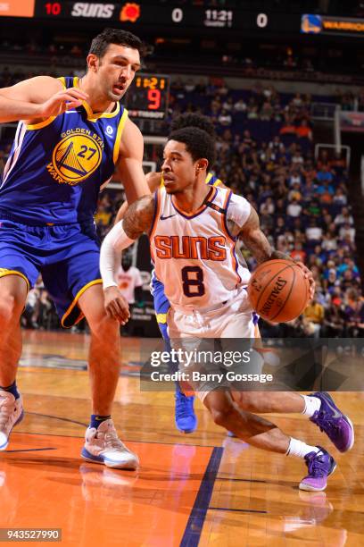 Tyler Ulis of the Phoenix Suns handles the ball during the game against Zaza Pachulia of the Golden State Warriors on April 8, 2018 at Talking Stick...