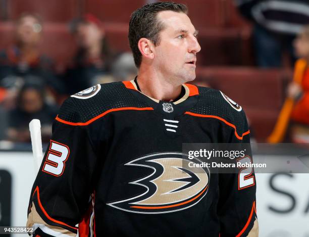 Francois Beauchemin of the Anaheim Ducks watches warm-up of his last career regular season home game before the game against the Dallas Stars at...