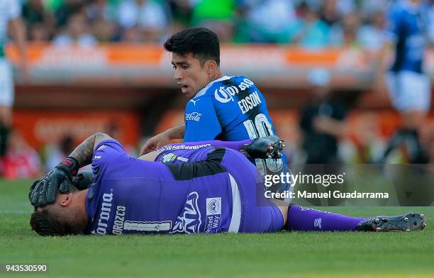 Edson Puch of Queretaro and Jonathan Orozco goalkeeper of Santos react during the 14th round match between Santos Laguna and Querataro as part of the...