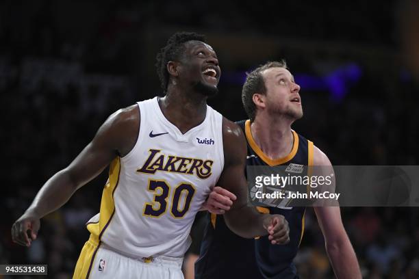 Julius Randle of the Los Angeles Lakers and Joe Ingles of the Utah Jazz in the second half at Staples Center on April 8, 2018 in Los Angeles,...
