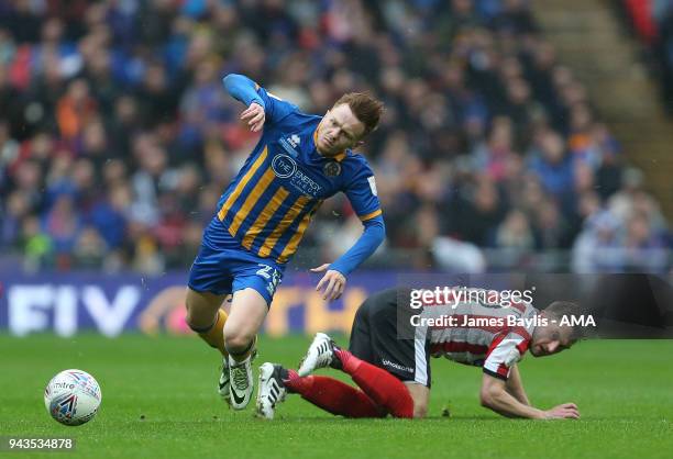 Jon Nolan of Shrewsbury Town and Lee Frecklington of Lincoln City during the Checkatrade Trophy Final between Lincoln City and Shrewsbury Town at...