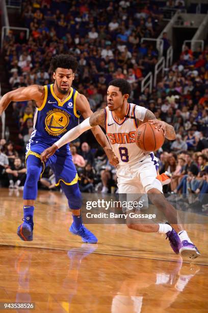 Tyler Ulis of the Phoenix Suns handles the ball during the game against Quinn Cook of the Golden State Warriors on April 8, 2018 at Talking Stick...