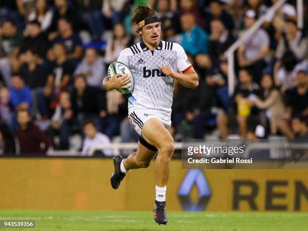 George Bridge of Crusaders runs to score a try during a match between Jaguares and Crusaders as part of 6th round of Super Rugby at Jose Amalfitani...