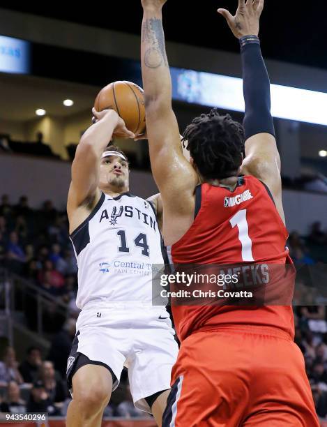 Nick Johnson of the Austin Spurs shoots the ball against Kennedy Meeks of the Raptors 905 during the NBA G-League Playoffs Game 1 on April 8, 2018 at...