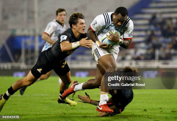 Manasa Mataele of Crusaders evades a tackle from Gonzalo Bertranou of Jaguares during a match between Jaguares and Crusaders as part of 6th round of...
