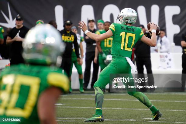 Oregon quarterback Justin Herbert throws a pass during the Las Vegas Bowl featuring the Oregon Ducks and Boise State Broncos on December 16, 2017 at...