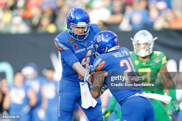 Boise State quarterback Brett Rypien hands the ball off to Boise State running back Ryan Wolpin during the second half of the Las Vegas Bowl on...