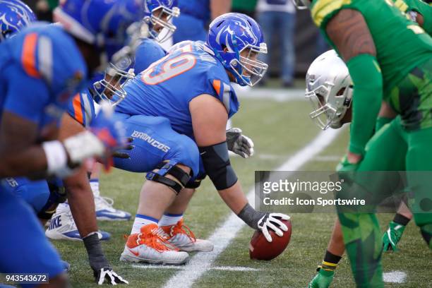 Boise State offensive lineman Mason Hampton prepares to snap the ball during the Las Vegas Bowl featuring the Oregon Ducks and Boise State Broncos on...