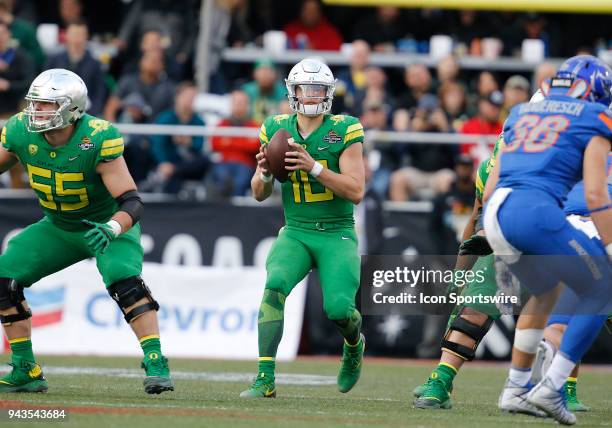 Oregon quarterback Justin Herbert drops back to pass the football during the second half of the Las Vegas Bowl on Saturday, Dec. 16 in Las Vegas. The...