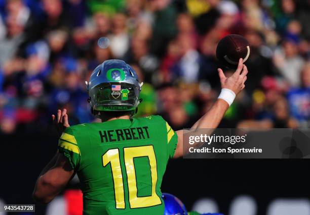 Oregon Ducks quarterback Justin Herbert passes against the Boise State Broncos in the second half of the 2017 Las Vegas Bowl at Sam Boyd Stadium on...