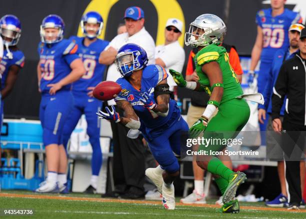 Boise State Broncos wide receiver Cedrick Wilson catches a pass as Oregon Ducks cornerback Deommodore Lenoir defends in the second half of the 2017...