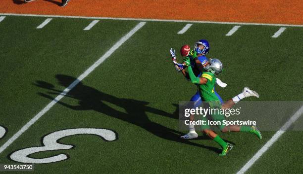 Boise State wide receiver Cedrick Wilson catches a pass for a first down as Oregon cornerback Thomas Graham Jr. Defends in the first half of the 2017...