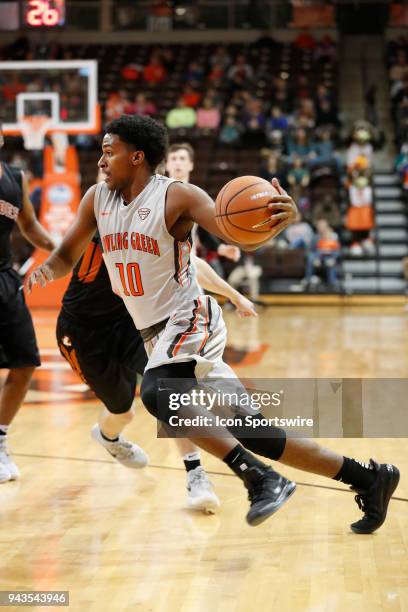 Bowling Green guard Justin Turner drives with the ball during a game between the Bowling Green State University Falcons and Lourdes University Gray...